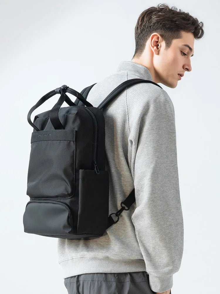 Black Oxford cloth computer backpack with 20-35 litre capacity and polyester lining