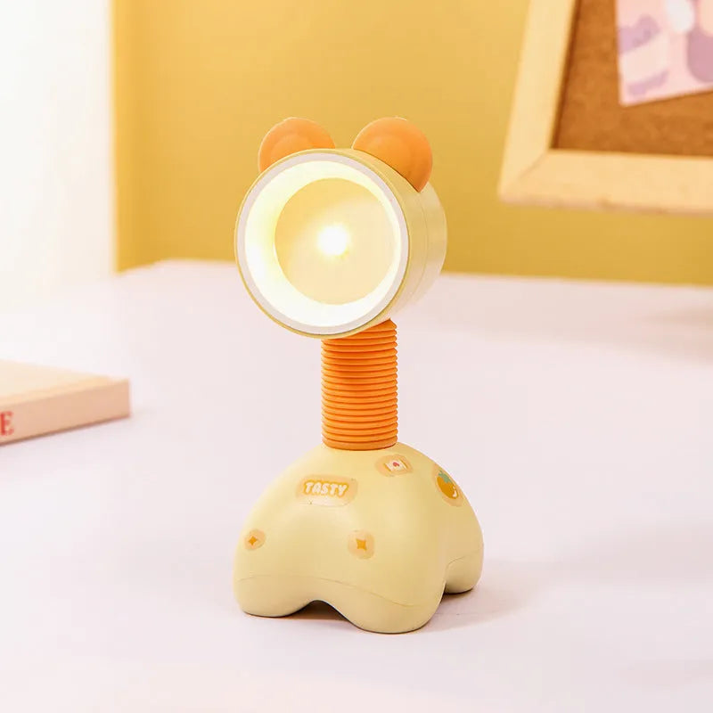 DIY cartoon magnetic small night lamp in assorted animal styles and colours on a desktop.