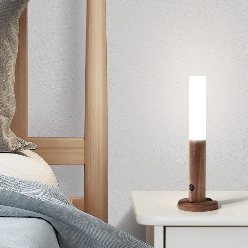Smart sensor LED desk lamp in wood and acrylic on a desk surface