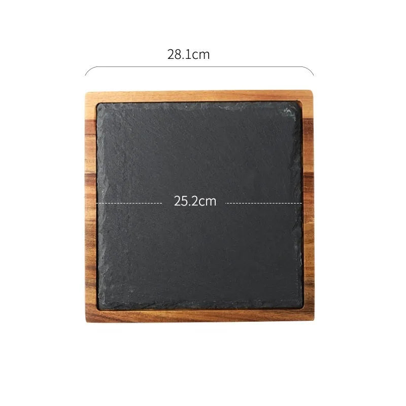Black wooden pizza dish made from acacia wood and stone, multi-colour sets, on a table