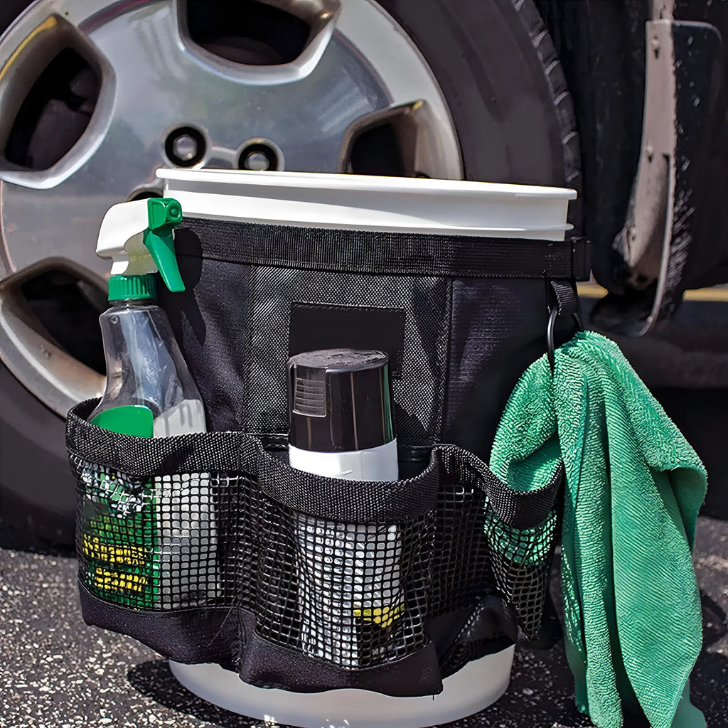 Black polyester bucket storage bag hanging on 5 gallon bucket for tool organisation