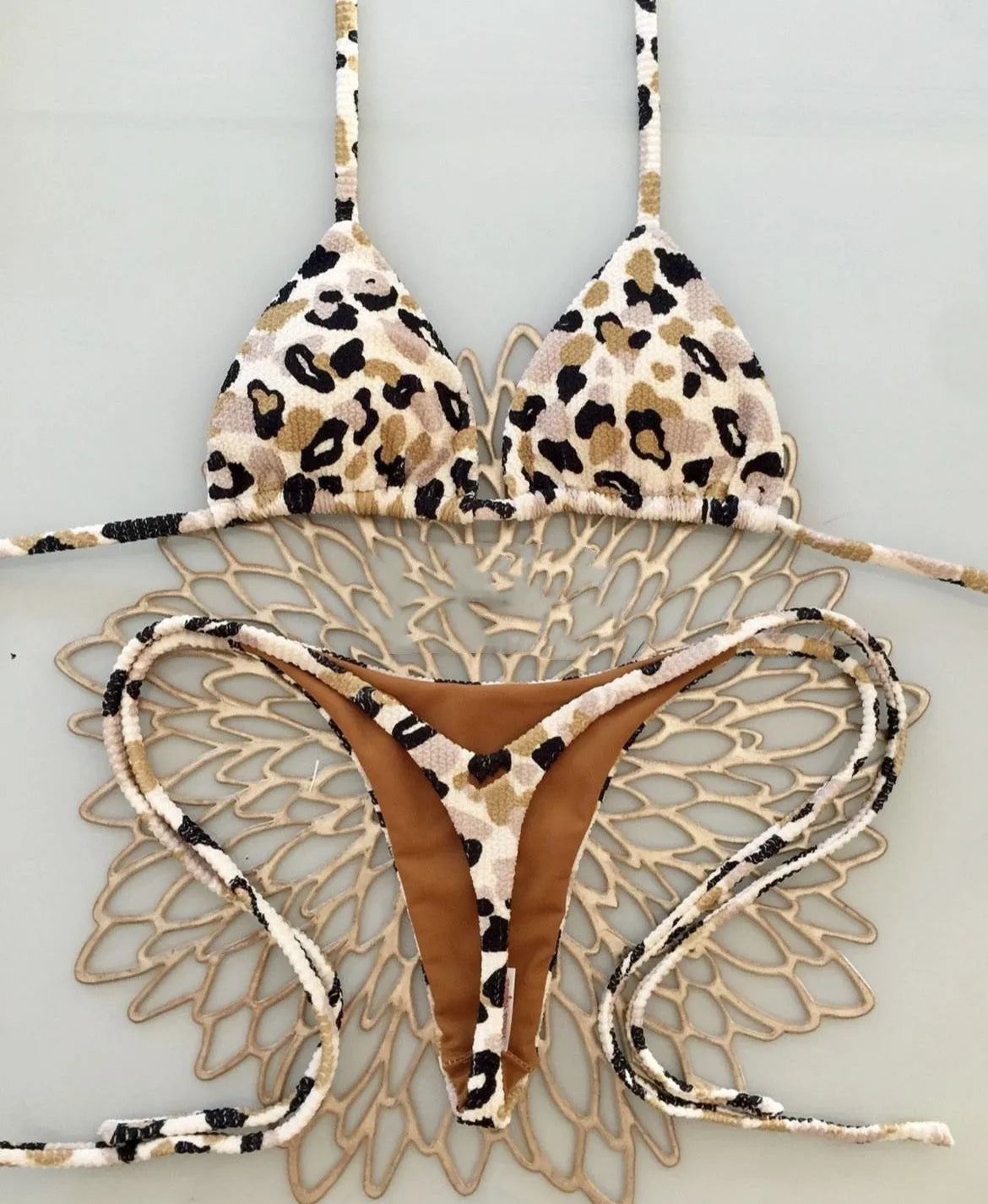 Women's printed bikini swimsuit with cotton lining in briefs style available in three colours