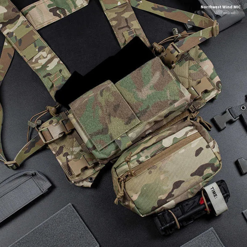 Multifunctional expandable breathable chest mount vest in Cordura fabric, unisex one size fits all, side view with gear pouches