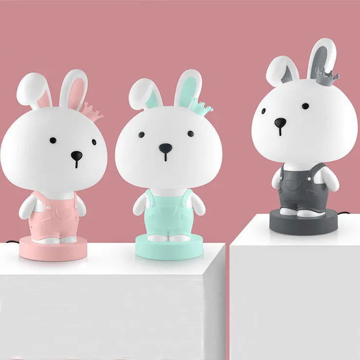 Cartoon animal table lamp in Bear, Cattle, Rabbit or Tiger design with LED light and plastic shade.