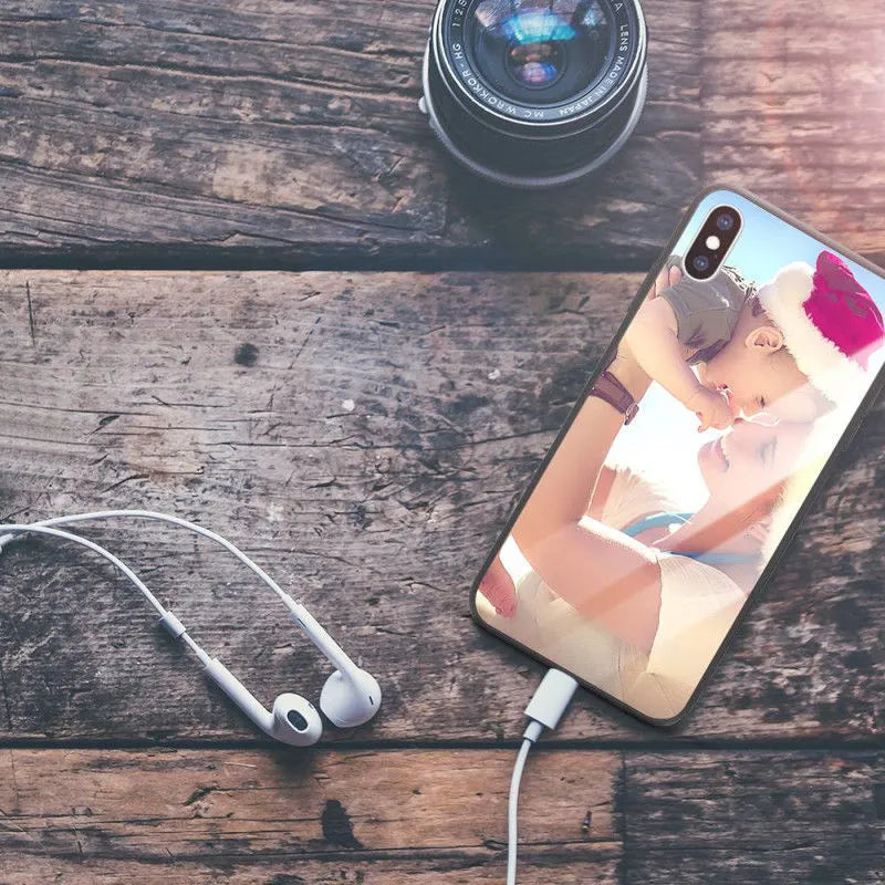 Ultra-thin iPhone case with raised bumper edge shown on an iPhone, highlighting camera and screen protection.