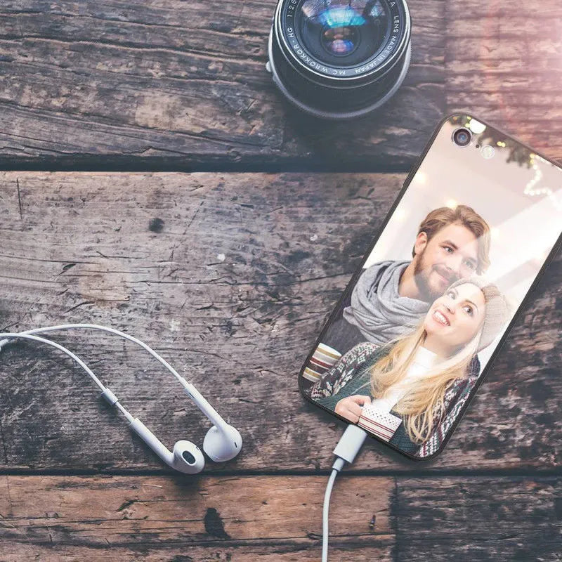 Ultra-thin iPhone case with raised bumper edge shown on an iPhone, highlighting camera and screen protection.