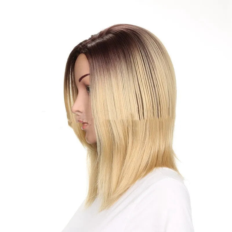 Short straight gold wig 16 inch length on a mannequin head for display