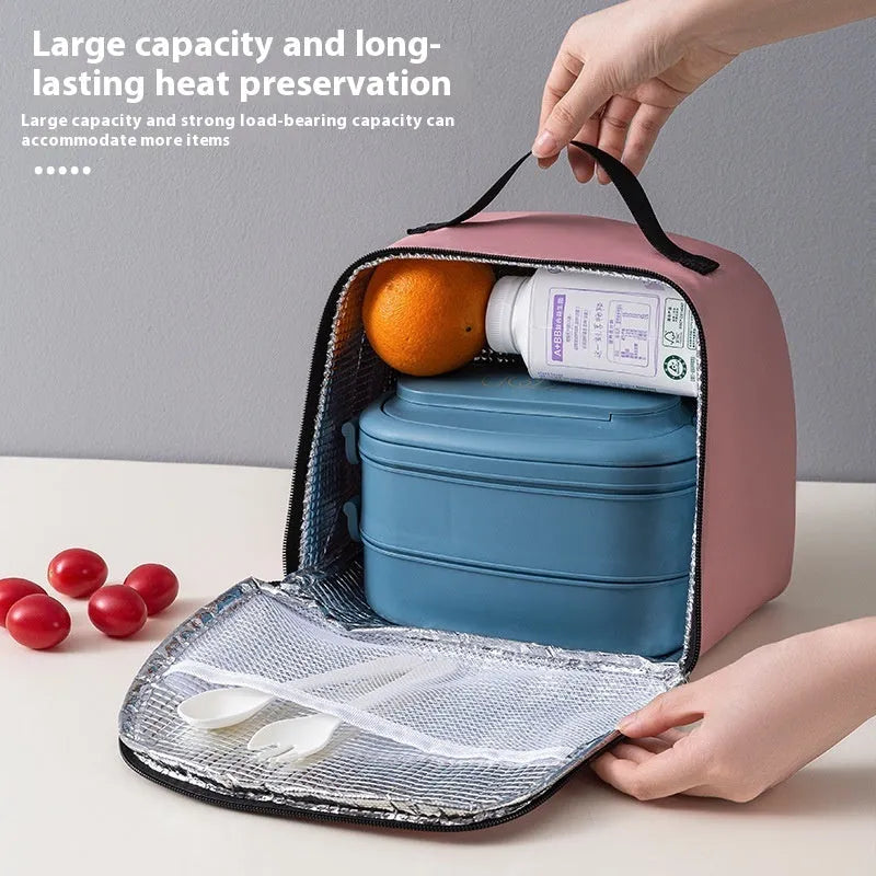 Insulated textured cloth lunch box bag in sapphire blue colour, shown with a lunch box inside.