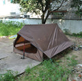 Brown or white A-line hiking tent pitched with hiking poles showing 210x150x110cm dimensions