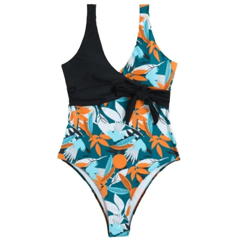 Women's high waist one-piece swimsuit in printed black or white pattern with conservative styling