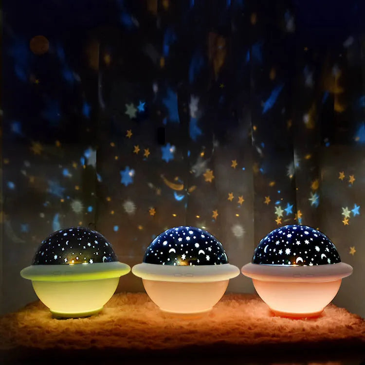 UFO-shaped star projection night light in green colour with USB cable