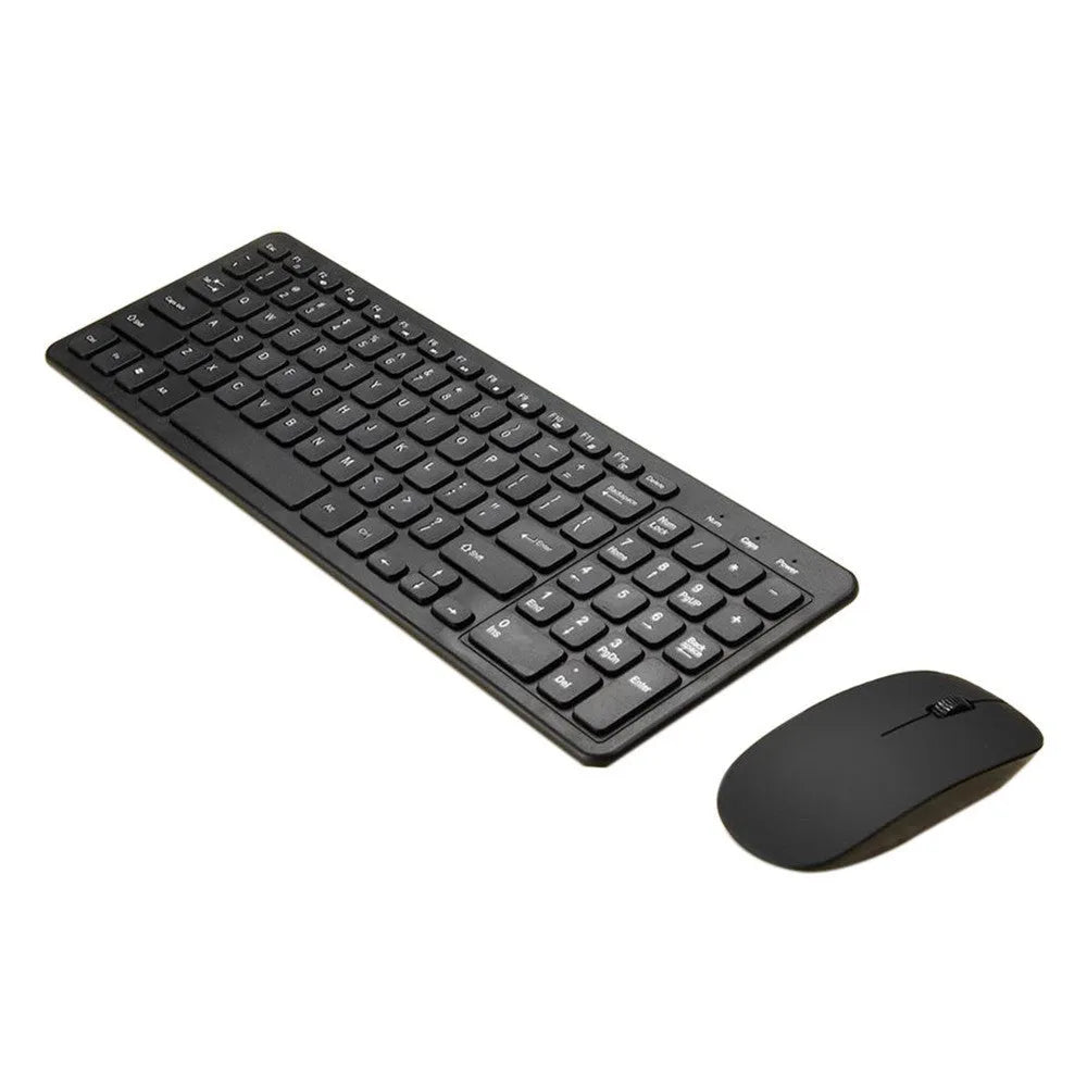 Black wireless keyboard and mouse set with USB receiver on a desk