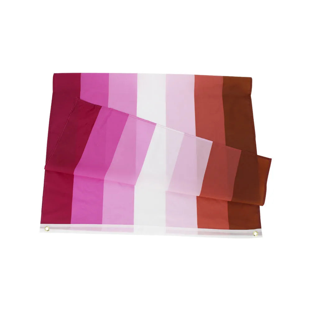 Lesbian pride rainbow banner, 90x150cm, polyester fibre, hung on a fence for display.