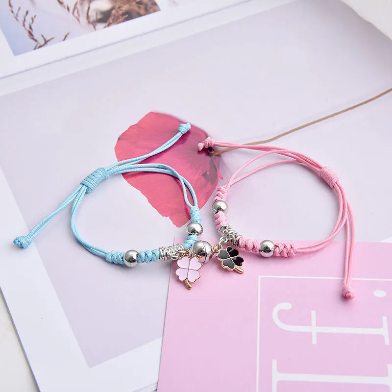 Alloy magnetic suction bracelet pair for couples with symbolic design options