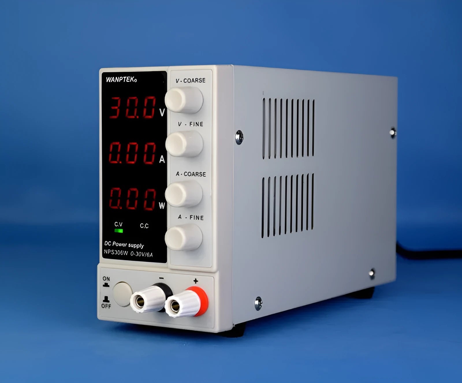 White adjustable benchtop DC power supply unit with digital displays for voltage and current.