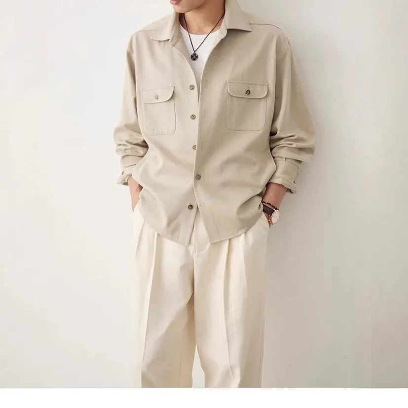 Men's simple profile long sleeve shirt in light sand rice colour with collage stitching detail.