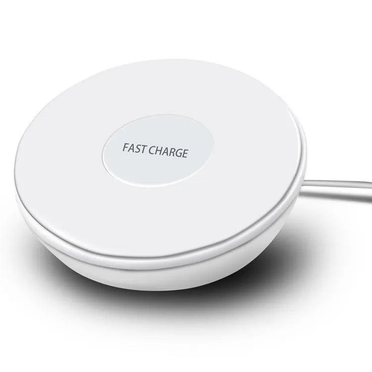 White wireless charger with digital clock display showing time and charging smartphone