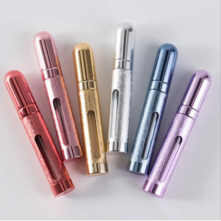 Slim 12ml aluminium and glass portable perfume bottle in multiple colours.