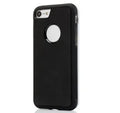 Anti Gravity Phone Case in black with self-adhesive back shown stuck to a glass surface