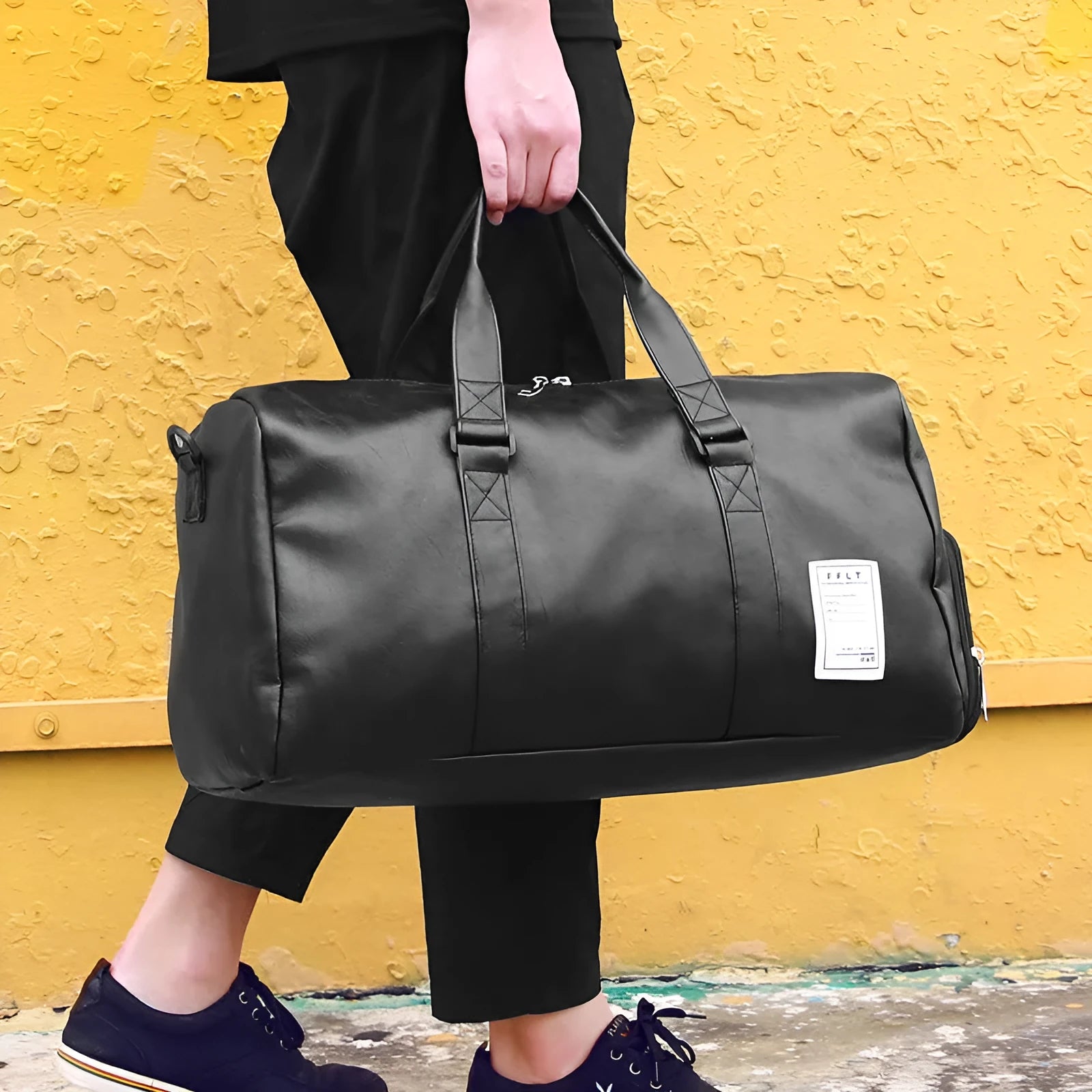 Black waterproof sports bag with shoe compartment and diagonal straps shown in two size options