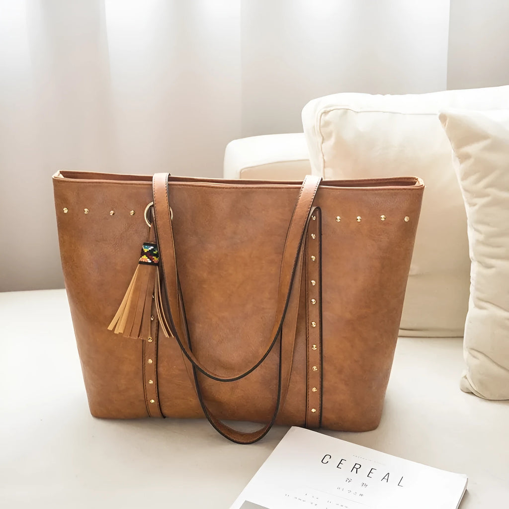Women's shoulder crossbody bag in black with textured finish and polyester lining