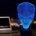 USB-powered acrylic 3D LED table lamp displaying blue light on a desk
