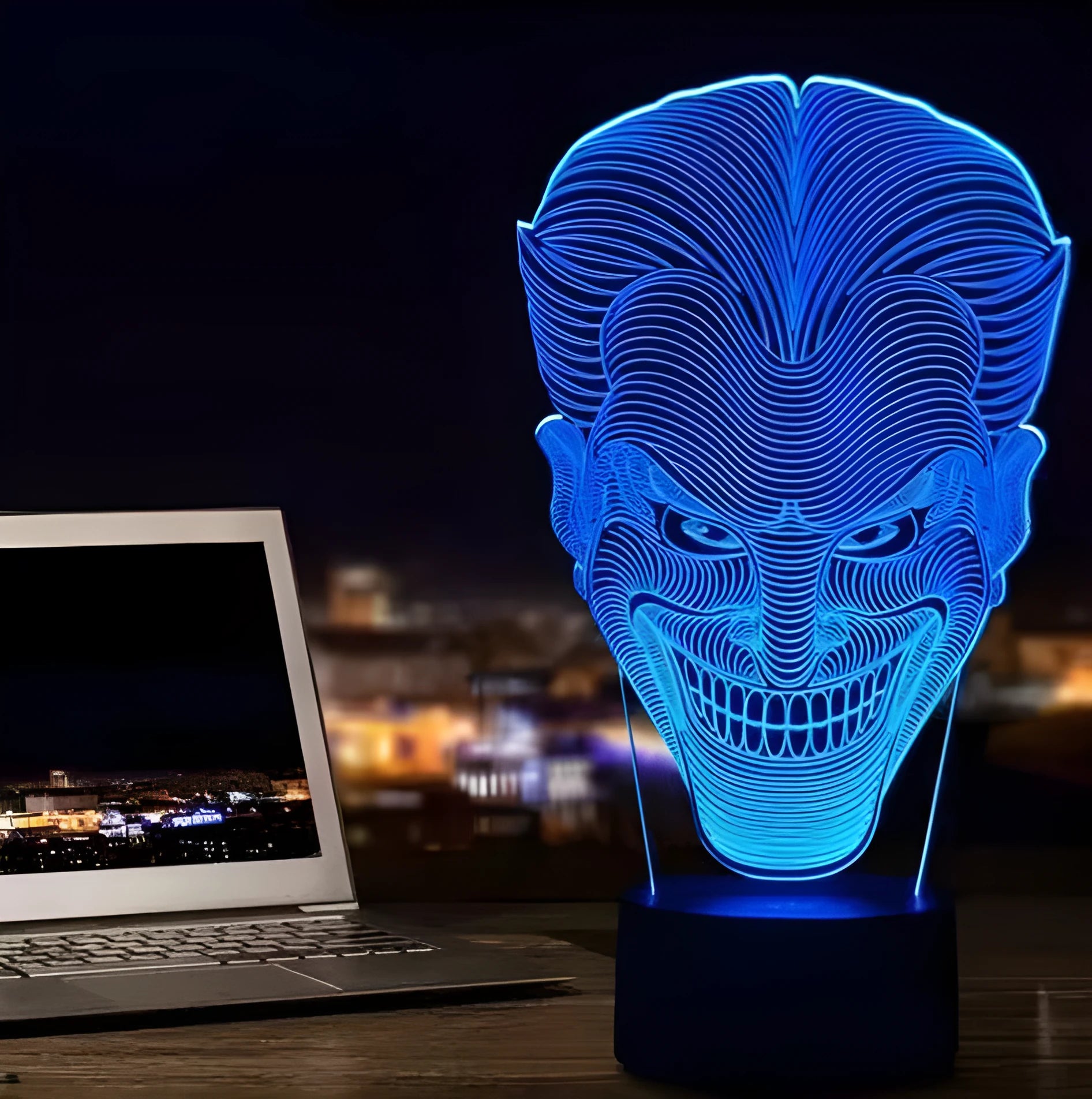 USB-powered acrylic 3D LED table lamp displaying blue light on a desk