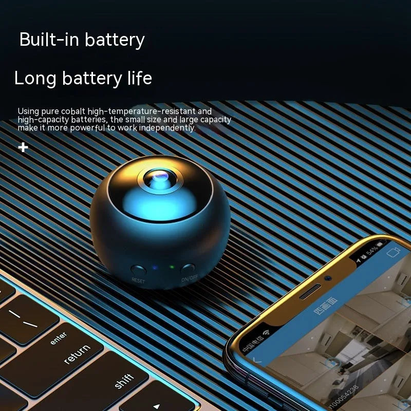 White indoor 1080p Wi-Fi security camera with USB cable on a table.