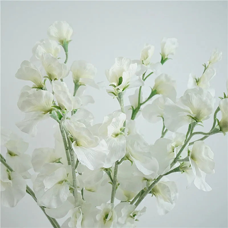 Single stem artificial silk pea flower in four colour options: pink, light purple, purplish red, white