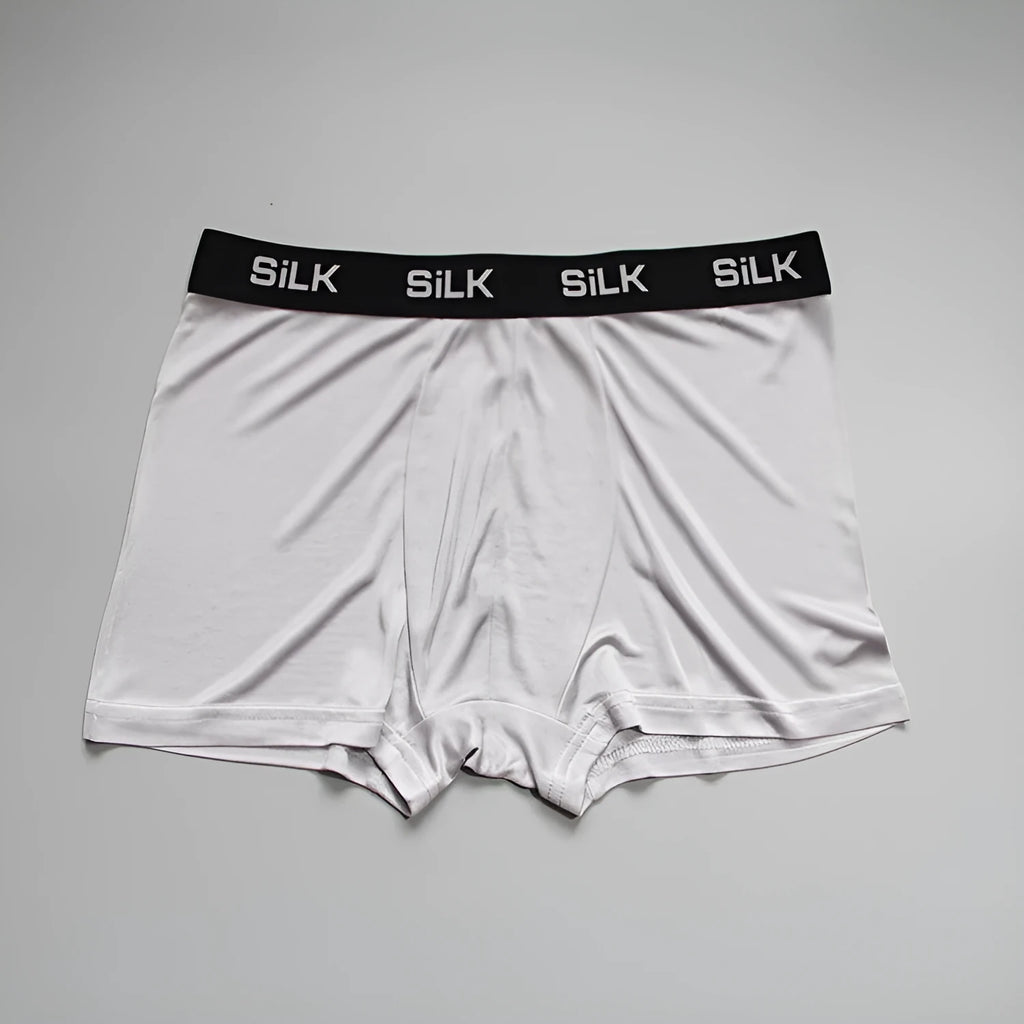 Men's loose fit silk shorts in navy blue with mid waist design for casual summer wear