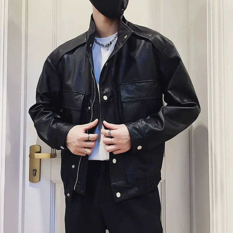 Men's black Korean-style PU leather jacket with straight hem and side pockets.