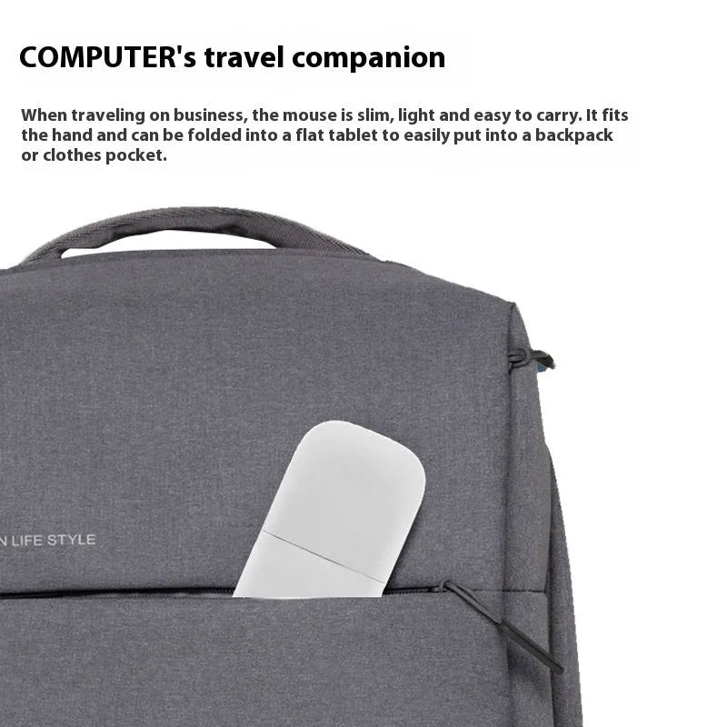 Folding wireless Bluetooth mouse shown in both extended and collapsed positions with touch surface visible