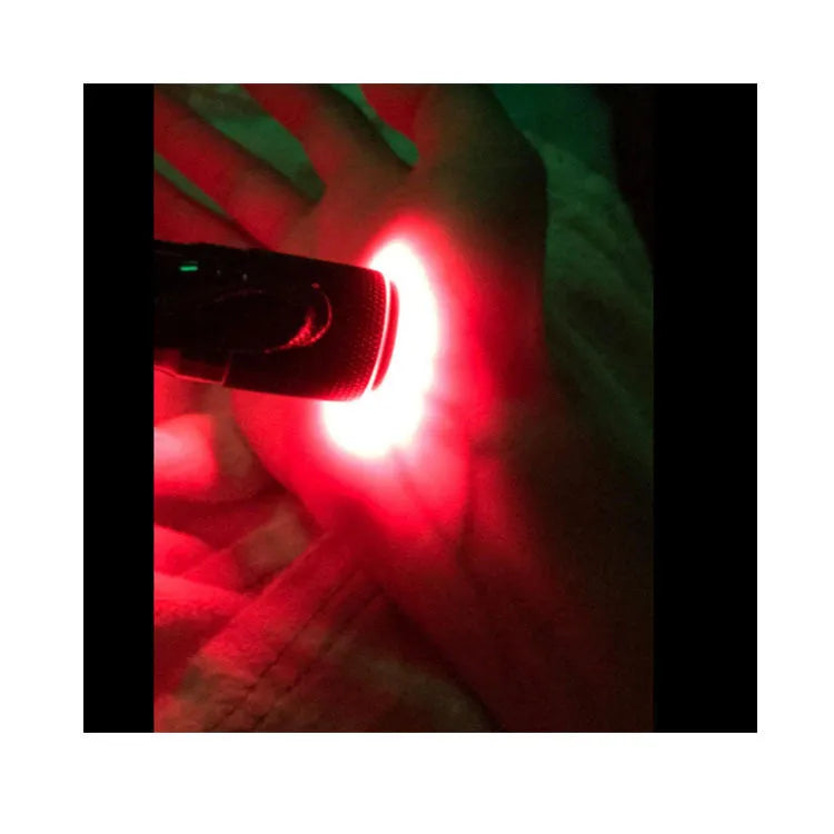 Black aluminium alloy Smart Vein Locator handheld medical device on a dark background.