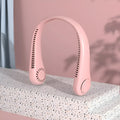 Pink USB rechargeable bladeless neck fan being worn, showing its lightweight and comfortable design.