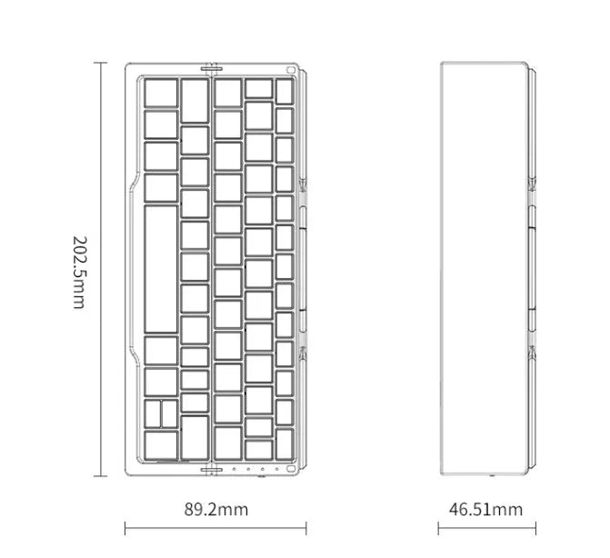 Mini foldable Bluetooth keyboard in black, open next to a smartphone on a wooden desk
