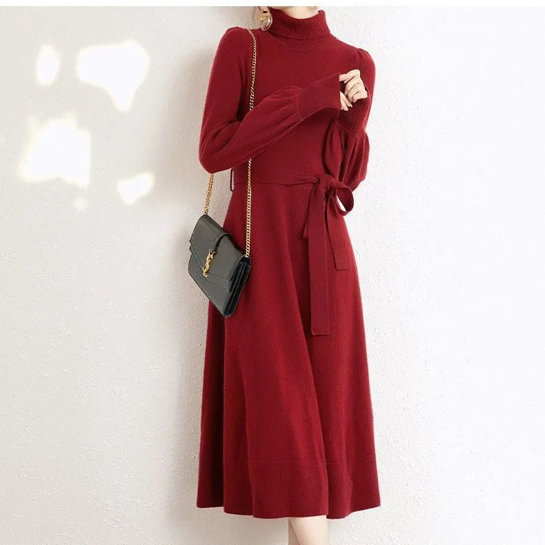 Women's solid color turtleneck knit dress with long sleeves and elastic waist in rose red, black, red, or blue