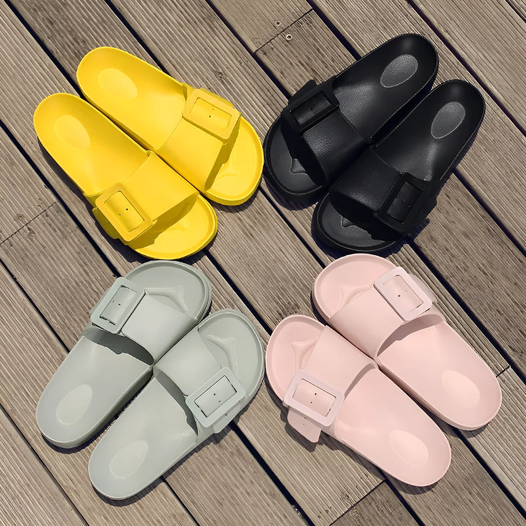 Women's grey blue flip-flop slippers with adjustable buckle strap and textured EVA sole