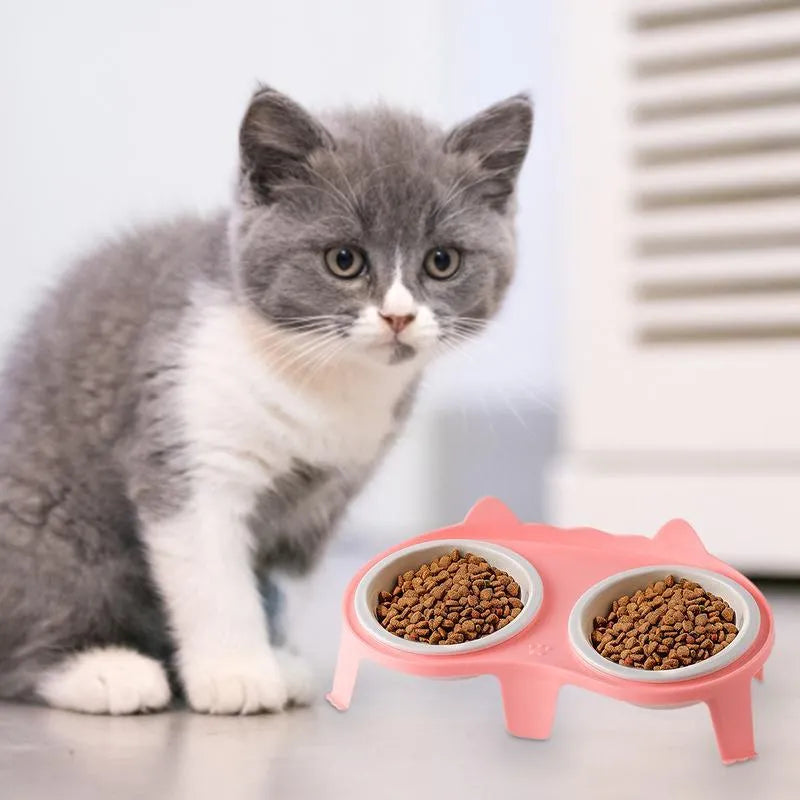 Ceramic cat food and water bowl set with elevated tilted stand in blue, pink, white, or yellow