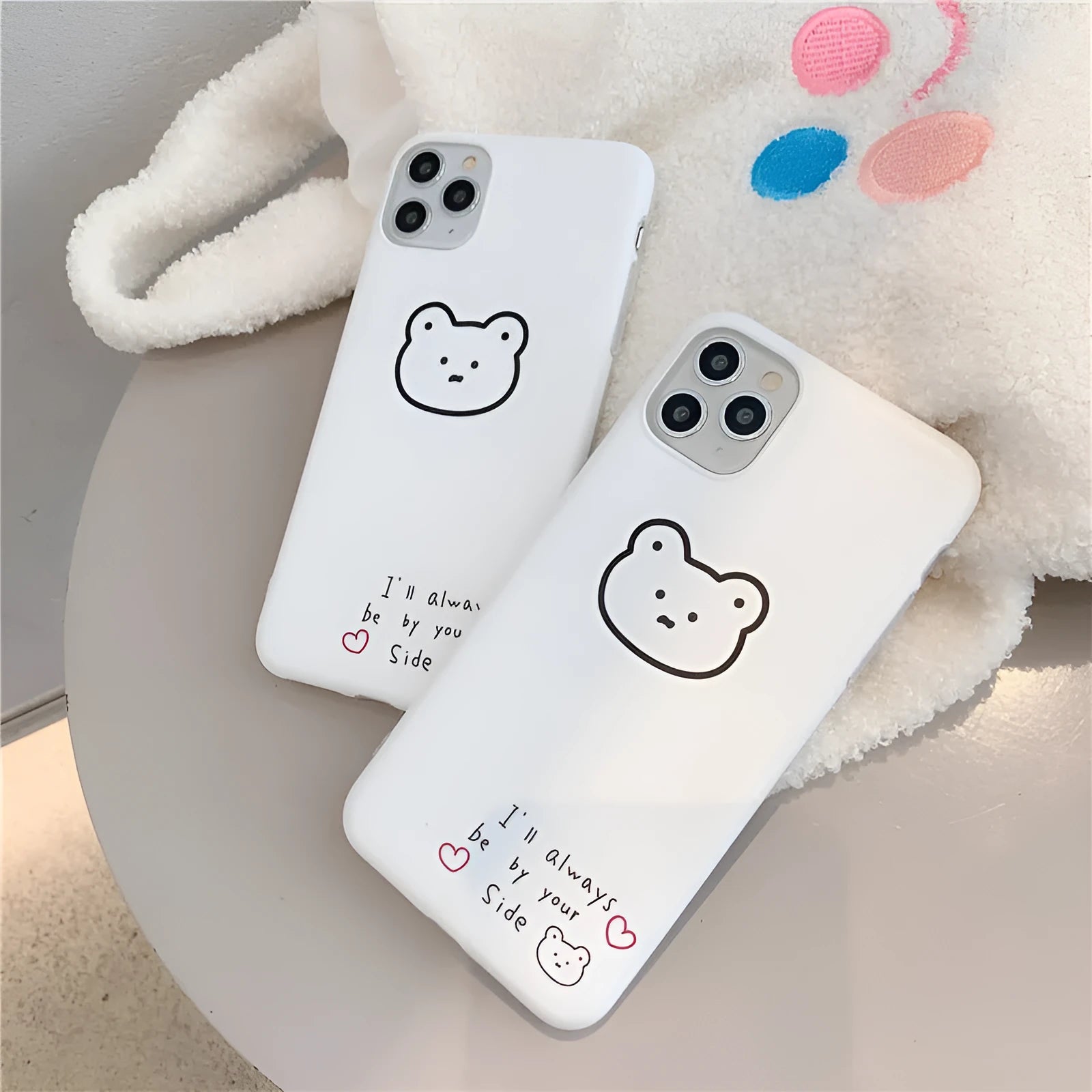 Soft silicone mobile phone case with Korean bear cartoon design for Samsung Z Flip 6 and iPhones.