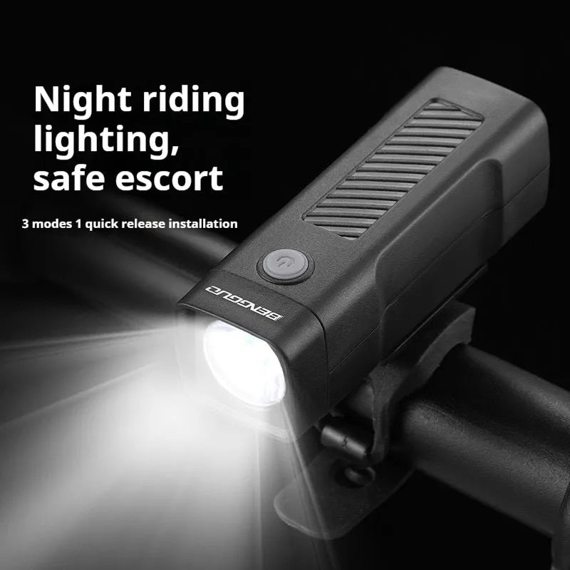 USB rechargeable bicycle headlight with quick release strap bracket mounted on handlebars