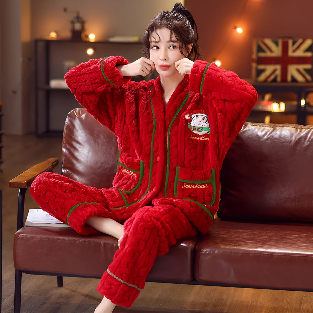 Winter women's flannel homewear set in red Christmas print with long sleeves and trousers on model