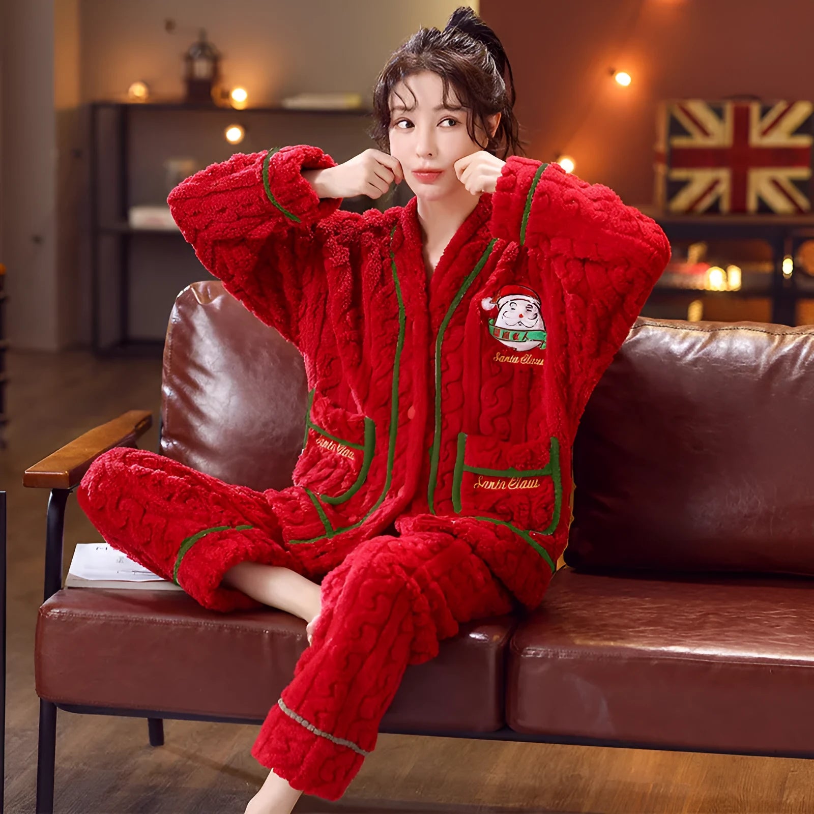 Winter women's flannel homewear set in red Christmas print with long sleeves and trousers on model