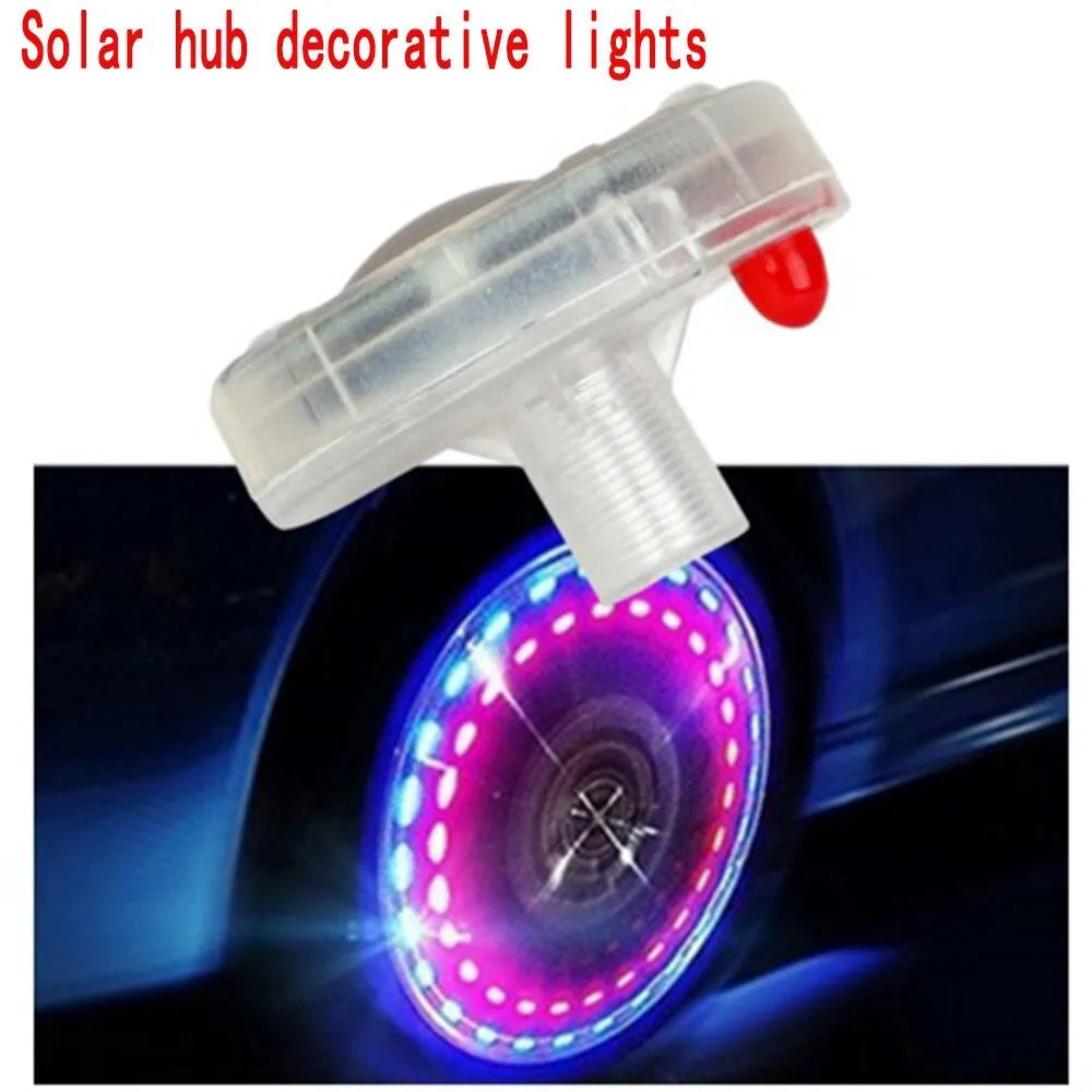 Solar car wheel decoration lights with red, green, and blue LEDs installed on a car wheel hub at night