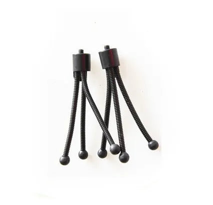 Small aluminium folding tripod with ball head mounted with smartphone on desktop