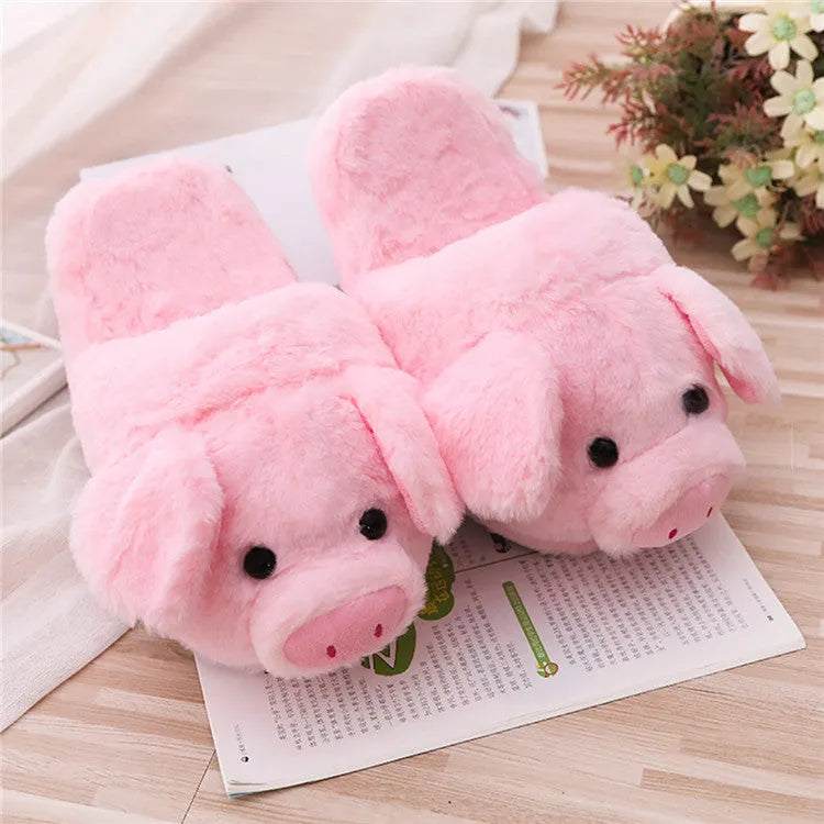 Pink pig floor slippers with short plush fabric and PP cotton filling.
