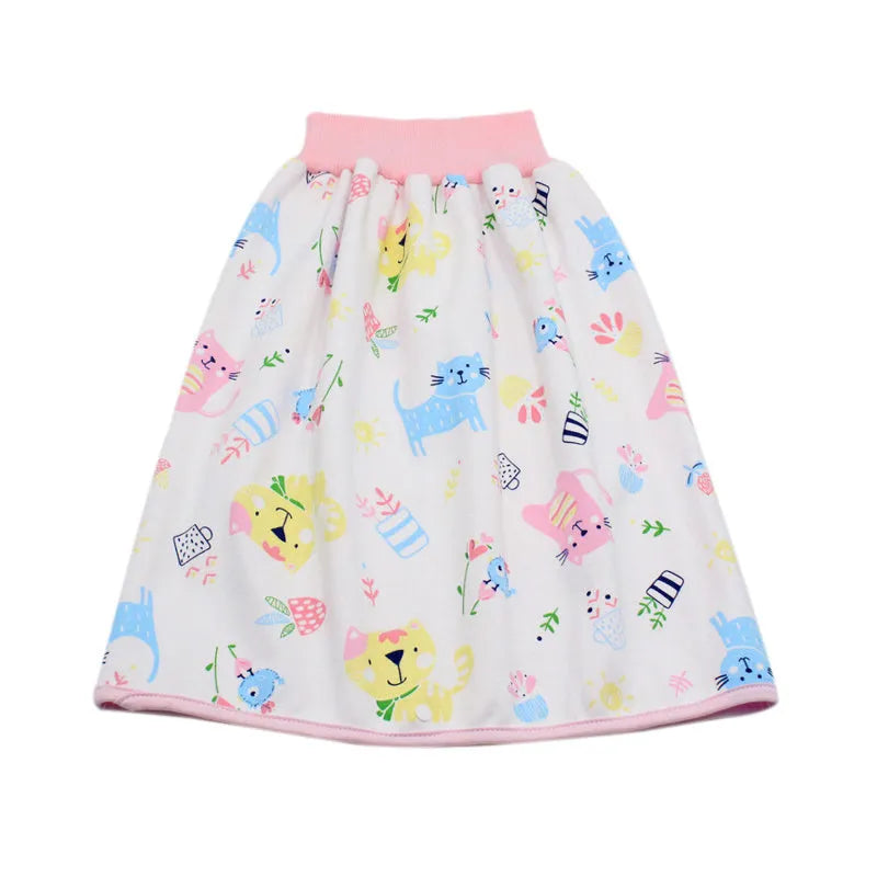 Baby girl wearing a multi-colour waterproof cotton diaper skirt with elastic waistband for belly protection