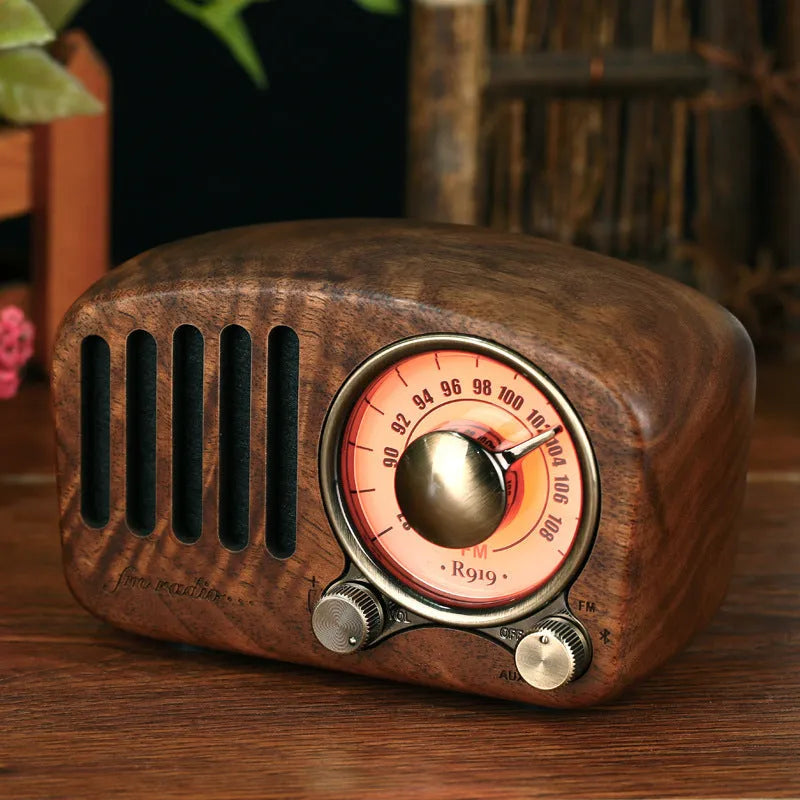 Retro wooden wireless mini speaker in cherry wood finish showing compact dimensions