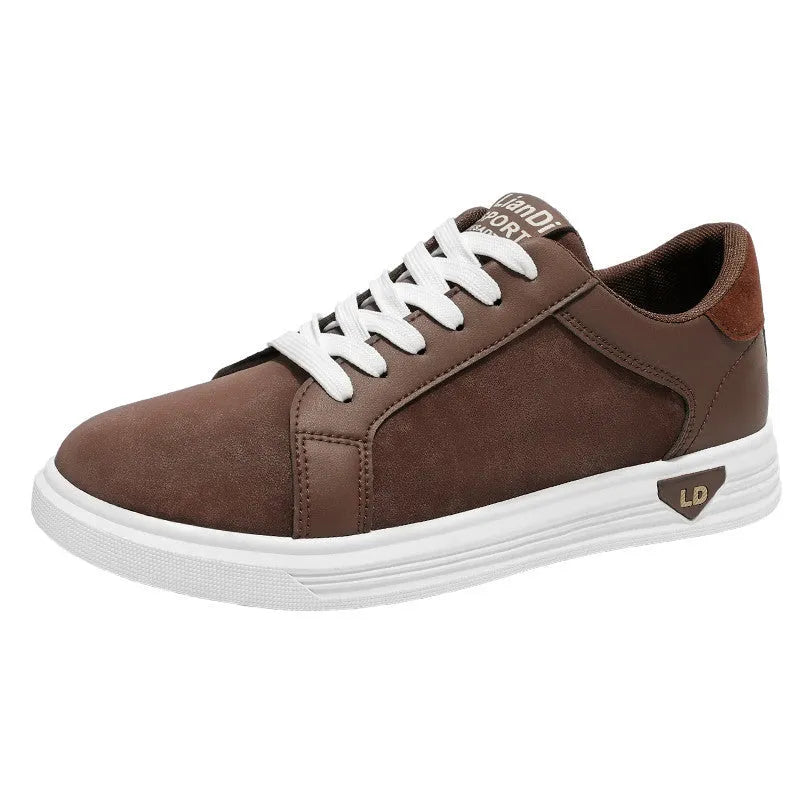 Men's black snake pattern PU leather sneakers with round toe and flat rubber sole.