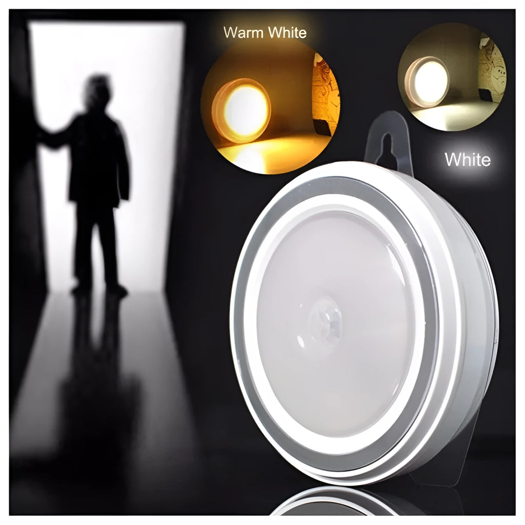 Circular white motion sensor LED light unit showing warm and white light options, 80mm diameter.