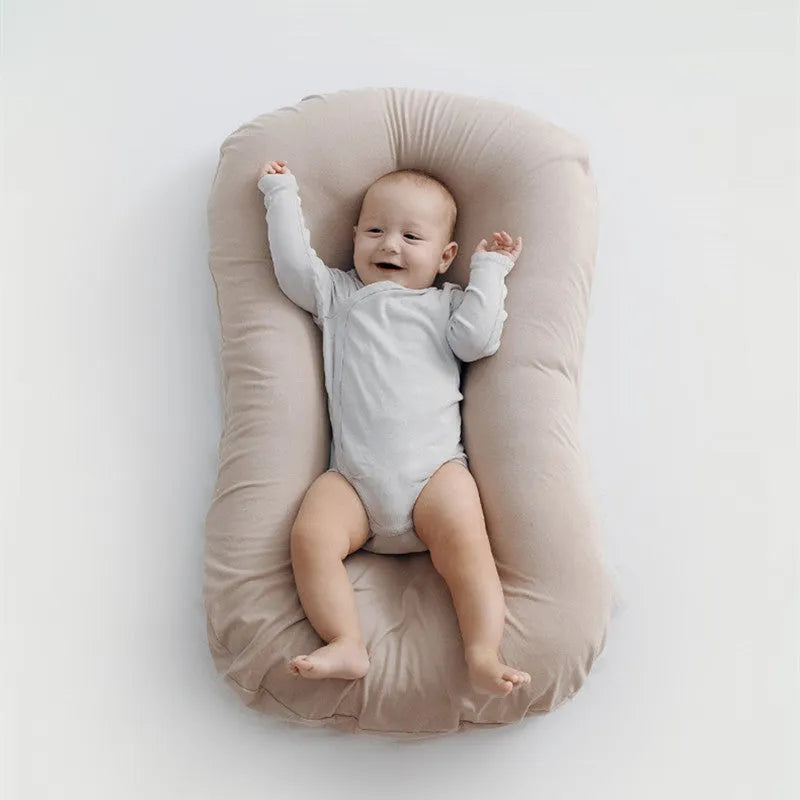 Portable baby nest crib with 75x45cm dimensions in cotton with PP filler
